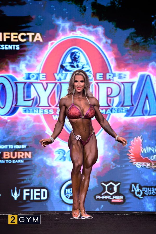 Olympia 2022 Wellness — Kassandra Gillis — A fitness model with a perfect body